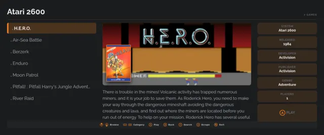Couch Mode browsing the Atari 2600 as a list, with artwork and metadata for H.E.R.O. beside it